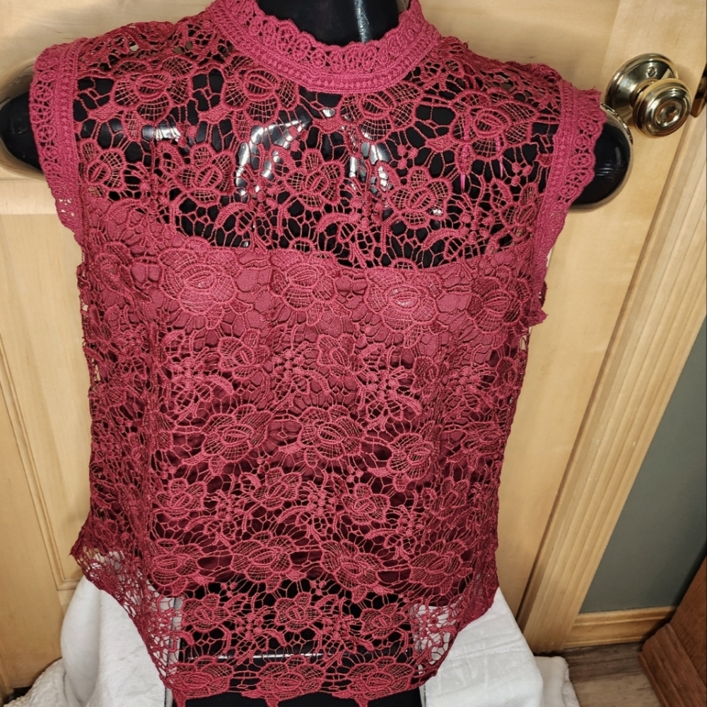 Women's lace top with built-in camisole .